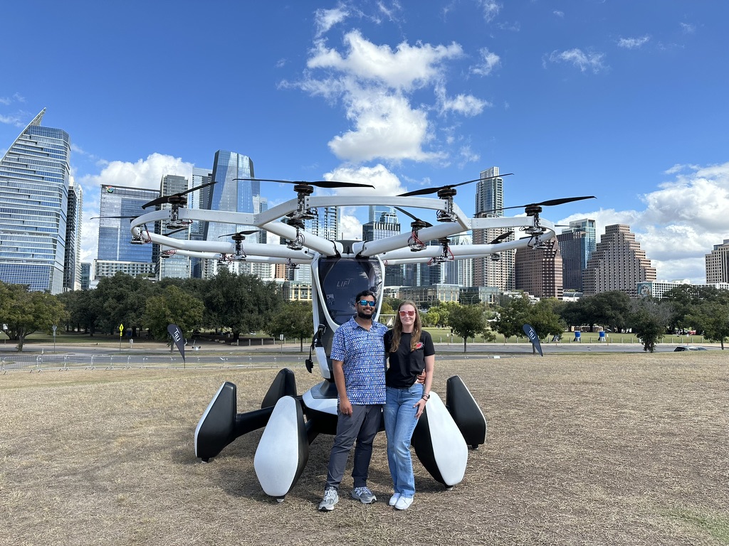 Surya and Leslie with an eVTOL aircraft in Austin
